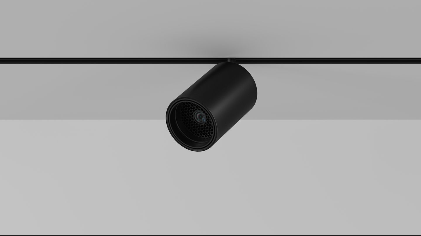 Черный цилиндрический модуль с объективом на треке